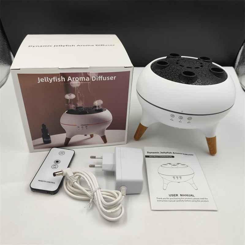 Jellyfish aroma diffuser with box, remote control, power adapter, and user manual on table