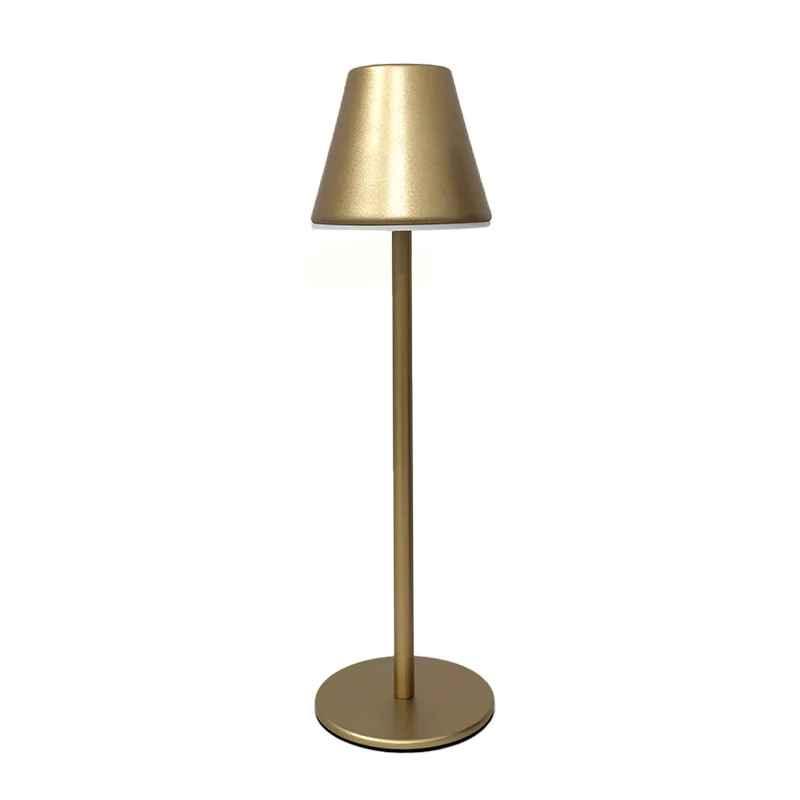 Modern gold table lamp with conical shade and round base on white background