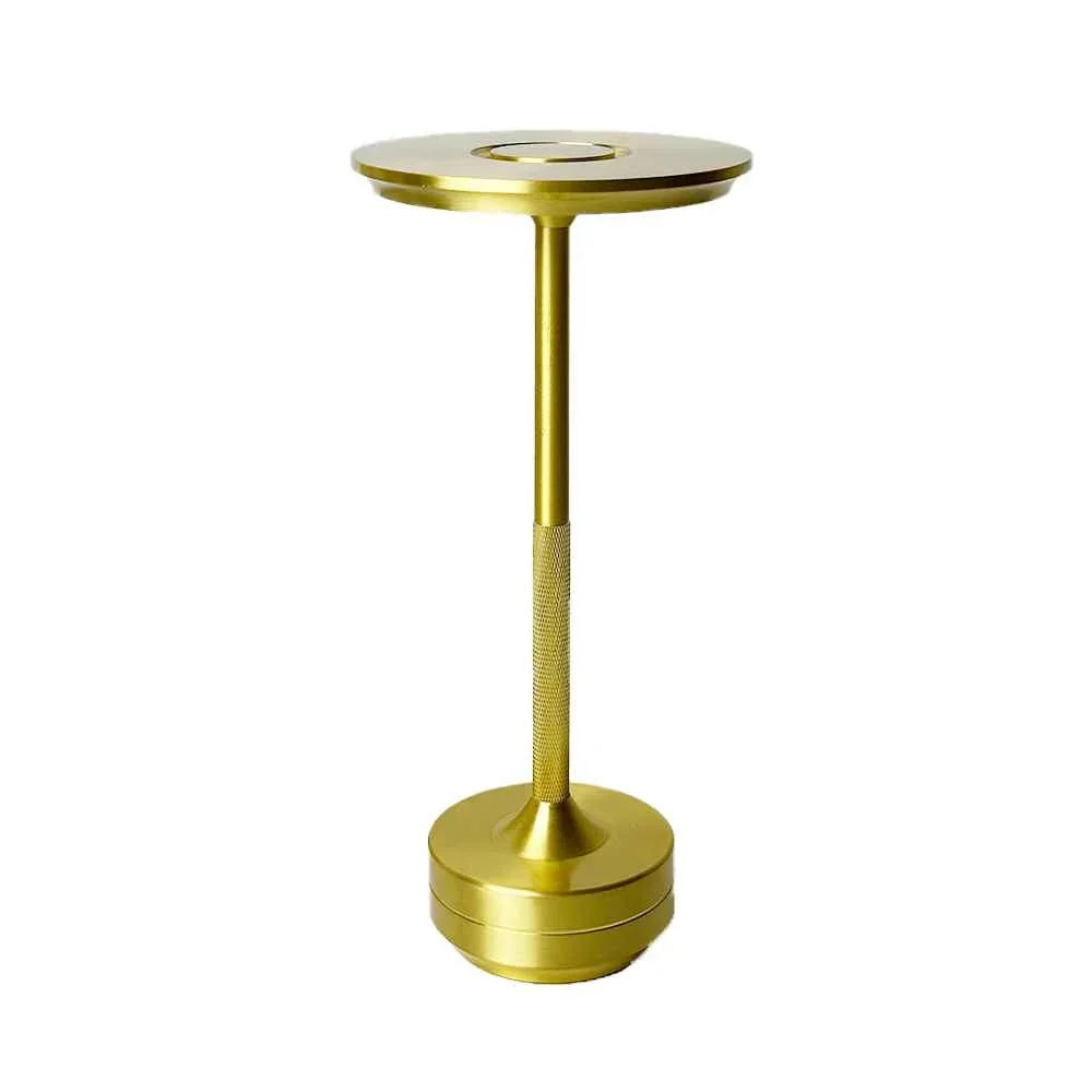 Modern gold metal ashtray stand with textured stem and round base on white background