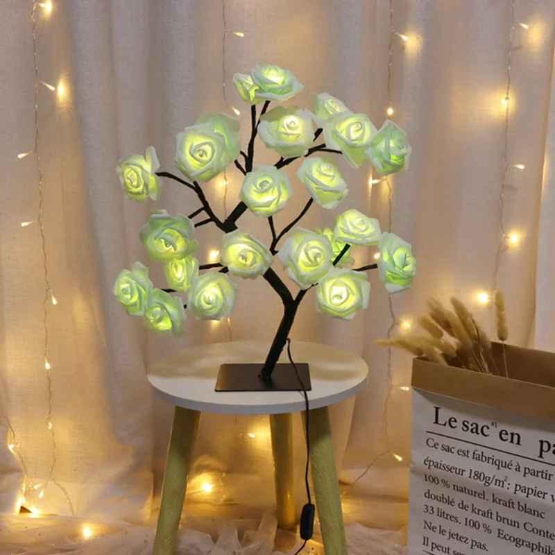LED rose flower tree lamp on a stool with fairy lights and home decor