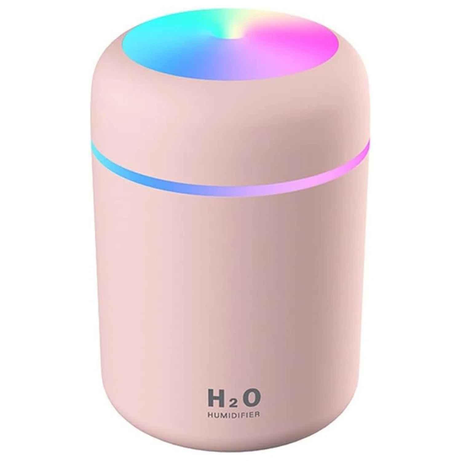Pink H2O humidifier with LED light and round design on white background