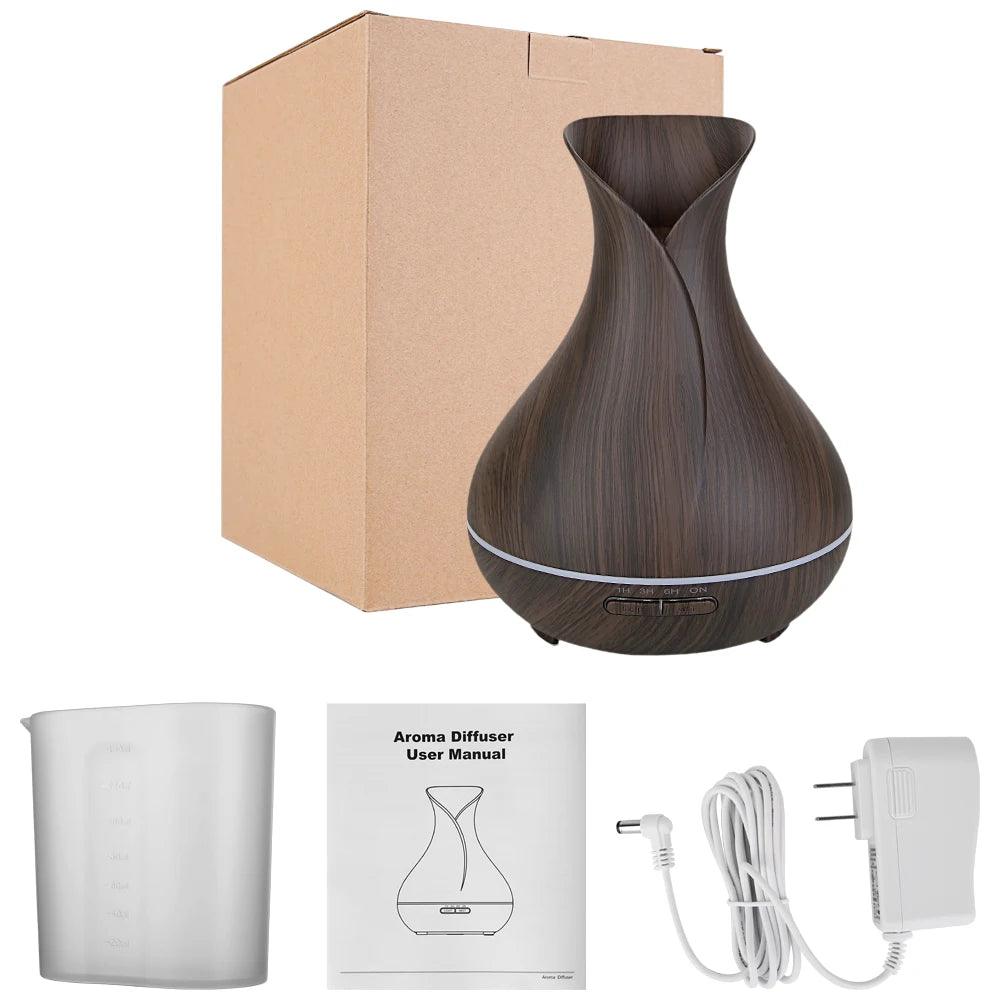 Dark wood grain aroma diffuser with box, measuring cup, user manual, and power adapter
