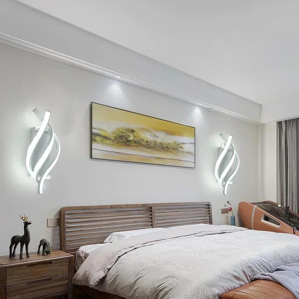 Modern bedroom with wooden bed, abstract painting, LED wall lights, and decorative deer figures