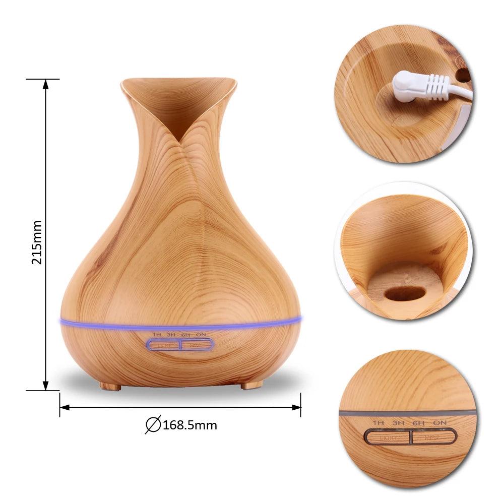 Wood grain essential oil diffuser, 215mm tall, 168.5mm wide, with close-up of power port, top opening, and control buttons.
