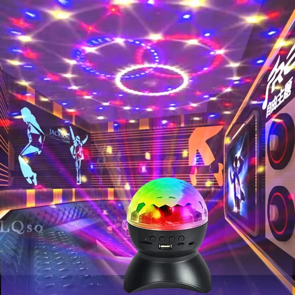 LED disco ball party light projector in a colorful karaoke room with dancing silhouettes