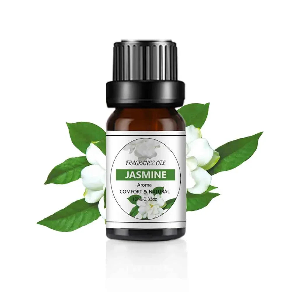 Bottle of jasmine fragrance oil with flowers and leaves on a white background
